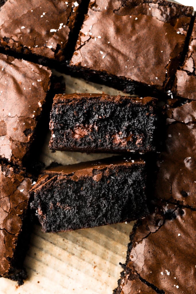 black cocoa brownies sliced with chocolate chips inside