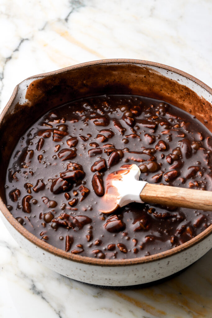 pecans and chocolate chips tossed into chocolate filling