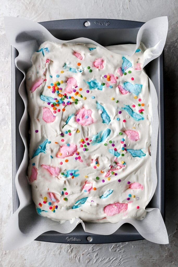no churn ice cream topped with cotton candy chunks and sprinkles