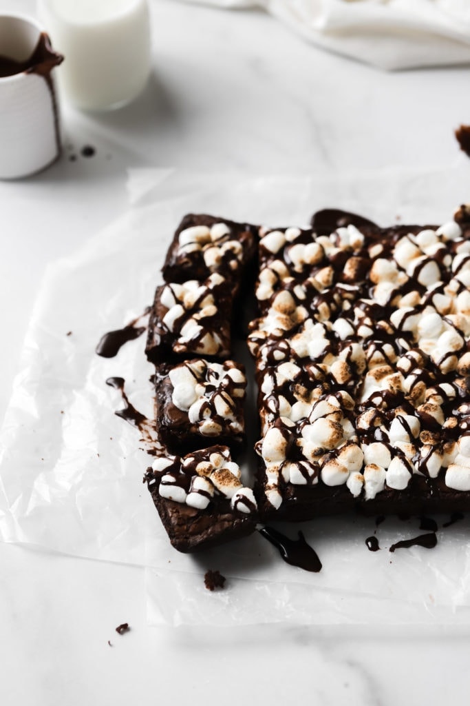 hot chocolate brownies with toasted marshmallows and chocolate drizzle