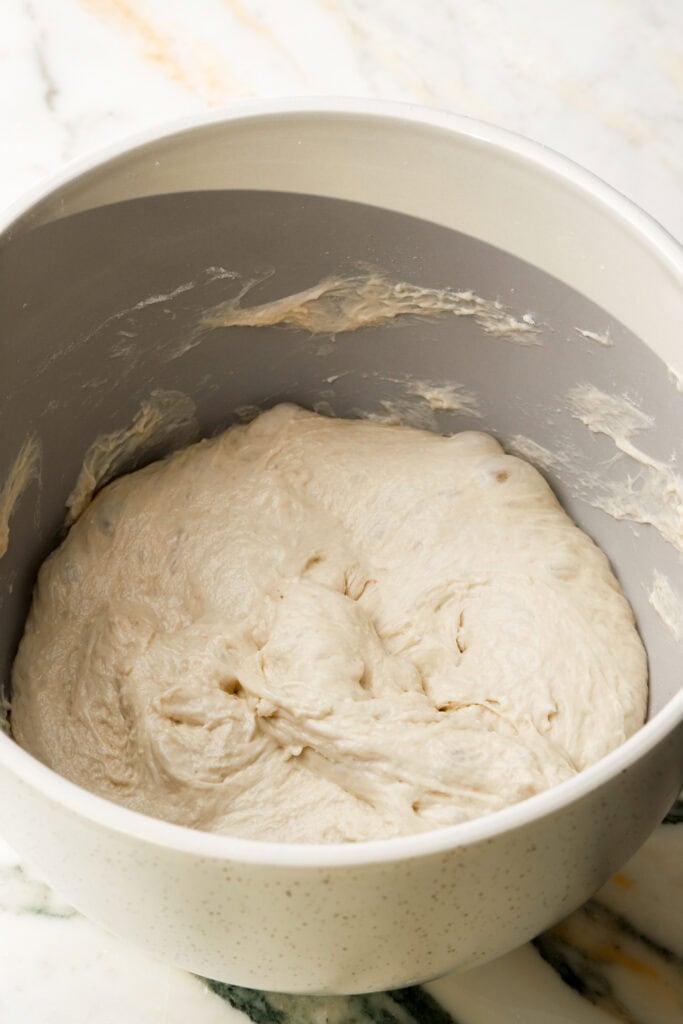 pull all the edges of the dough away from the bowl