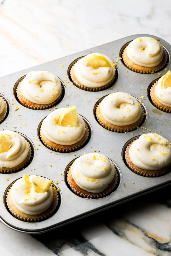 lemon cupcakes frosted with lemon cream cheese frosting