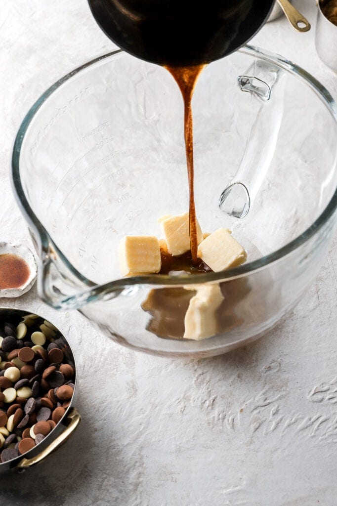 pouring brown butter over regular butter